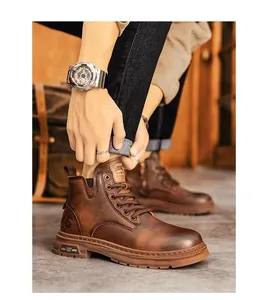 Close-up detail of men's brown vintage leather Martin boots with rugged lace-up design