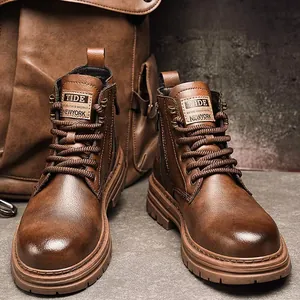 Detailed close-up of retro brown leather work boots with a side zipper and durable rubber sole
