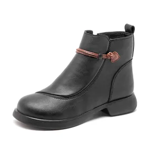 Black leather ankle boots for women with warm lining and decorative heart strap