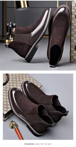 Detailed view of men's brown Chelsea boots with mixed leather and suede textures