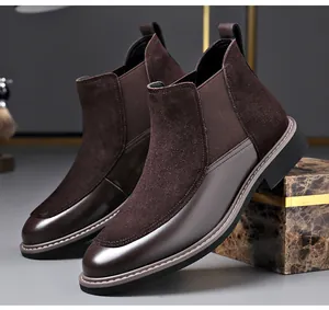 Detailed view of men's brown Chelsea boots featuring premium leather and suede splicing