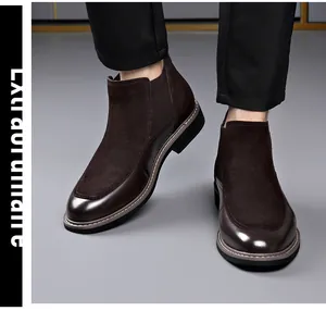 Close-up detail of premium brown spliced leather and suede Chelsea boots for men