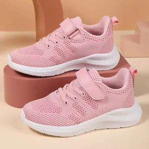 Breathable pink mesh sneakers for girls featuring a lightweight white sole and velcro strap