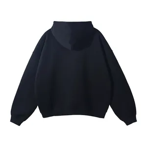 Back view of minimalist men's oversized black hoodie featuring a no drawstring design