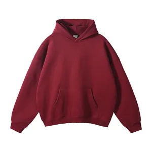 Front view of wine red oversized hoodie without drawstring showing texture and pocket