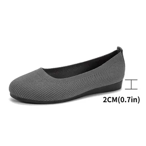 Detailed view of grey knit round toe flat shoes with a comfortable 2cm heel height