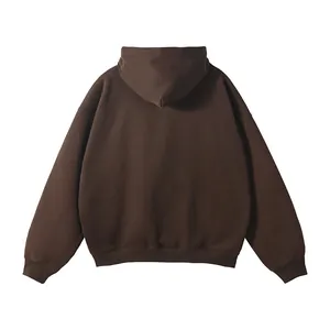 Macro view of the back of a brown oversized hoodie with a clean, no-drawstring design