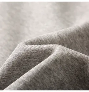 Macro view of soft breathable heather gray knit cotton fabric texture for men's hoodie
