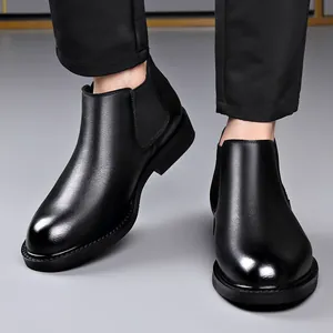 Classic men's black Chelsea boots with glossy leather finish and elastic side panels