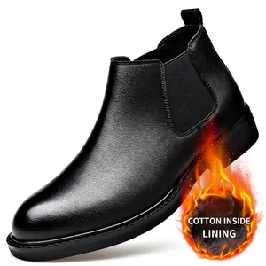 Stylish black leather men's Chelsea boots featuring warm fleece lining for winter comfort