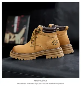 Detailed view of genuine leather yellow boots with platform sole and 'Fashion' logo design