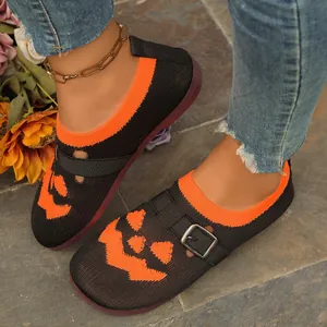 Women's Halloween pumpkin print flyknit flats with breathable knit upper and buckle strap.