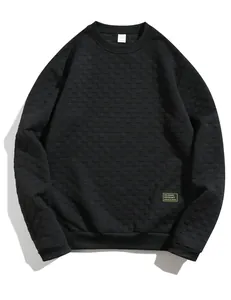 Close-up detail of black heavyweight waffle texture men's crewneck pullover sweatshirt