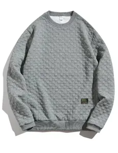 Detailed view of gray heavy checkered textured men's loose crewneck sweatshirt pullover