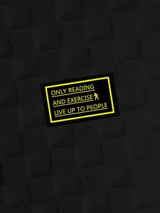 Detailed macro view of black heavy checkered sweatshirt fabric with yellow text patch