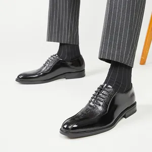 Elegant black crocodile embossed leather oxford shoes for men in a formal business style