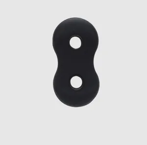 Detailed macro view showing the matte texture of a black silicone 8-shaped drawstring buckle