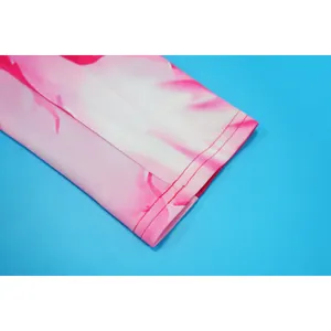 Close-up of pink floral print sleeve with high-quality double-needle stitching