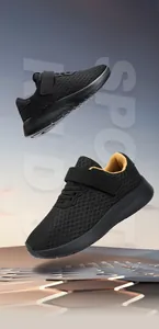 Zapatillas de running para niños de malla negra transpirable con cierre de velcro muy práctico