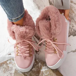 Botas de nieve rosas con forro de piel sintética, cordones y suela de plataforma blanca