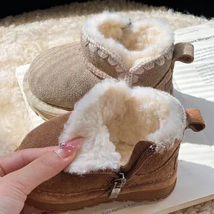 Warm children's fleece-lined snow boots for winter with side zipper detail
