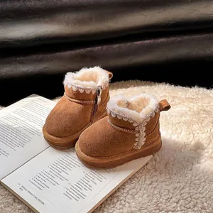 Cozy brown fleece-lined snow boots for toddlers with side zipper and warm interior