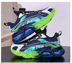 Close-up of boys' sports shoes with rotary buckle closure and neon green sole