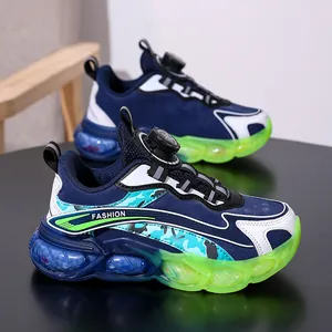 Boys navy blue breathable sports shoes with rotary buckle and neon green accents