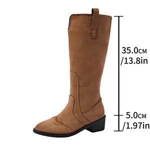 Detailed view of brown suede pointed toe tall boots showing 35cm shaft and 5cm heel height