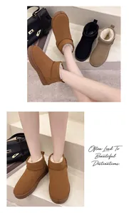 Close-up of warm women's snow boots with plush lining and thick platform soles.