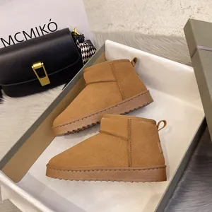 Women's warm camel suede snow boots with thick soles and plush lining for winter