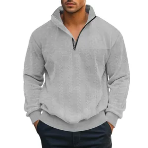 Gedetailleerd overzicht van grijze herensweatshirt met jacquardpatroon en rits