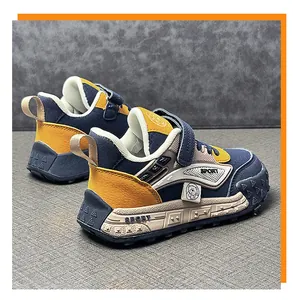 Stylish kids leather sports sneakers with navy and yellow patchwork for boys and girls