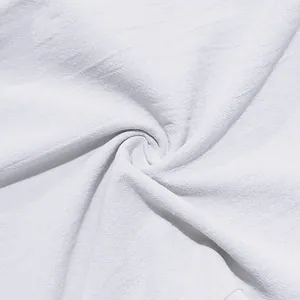 Macro texture dettagliata di tessuto in lino bianco per pantaloni casual da uomo