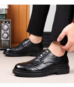 Detail of black textured leather business casual shoes for men in British style