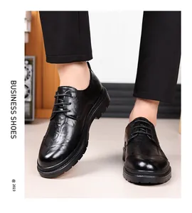Detailed view of men's black leather business shoes with hand-crinkled texture