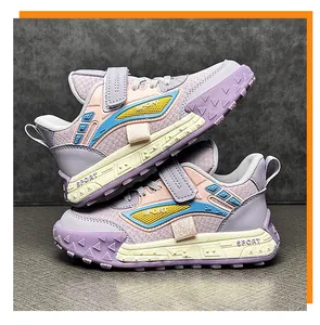 Detailed macro view of colorful kids fashion sneakers with textured leather and velcro straps