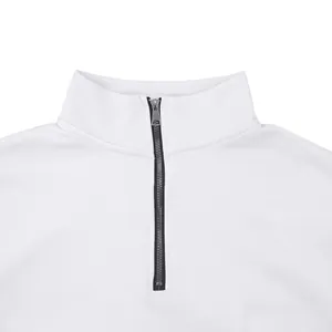 Detail of white men's quarter-zip sweatshirt with a metallic zipper and stand collar.