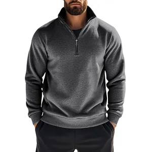 Professional close-up view of a men's quarter-zip fleece sweatshirt in premium dark gray color