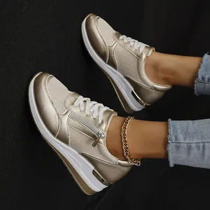 Goldene Damen-Wedge-Sneaker mit dicker weißer Sohle und seitlichem Reißverschluss