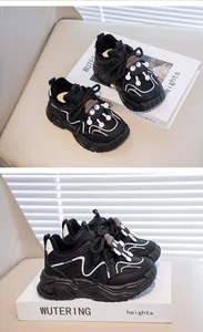 Detailed view of children's warm sports shoes with cartoon character decoration