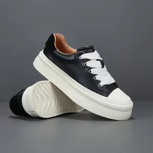 Men's genuine leather black platform sneakers featuring wide white laces and thick soles