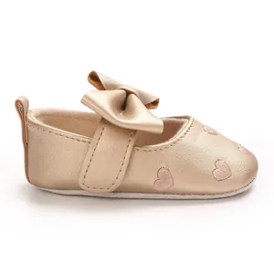 Chaussure princesse bébé or champagne avec joli nœud et broderie de cœur