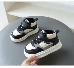 Detailed view of kids winter sneakers with warm fleece lining and color block design