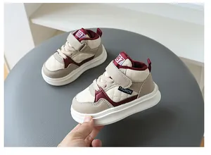 Detail view of warm children's winter sneakers with soft lining and beige finish