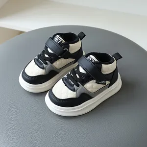Warm fleece-lined high-top children's sneakers featuring a stylish quilted pattern design