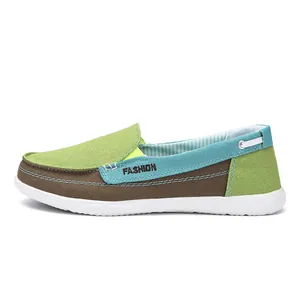 Side profile of men's casual multi-color canvas slip-on shoe with durable white sole
