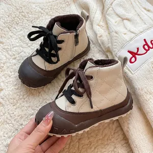 Cozy children's winter short boots featuring warm plush lining and convenient side zipper