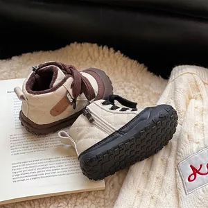 Quilted toddler winter walking boots with soft non-slip soles in cream and brown.