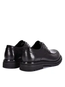 Detailed rear perspective of men's professional black leather round toe dress shoes